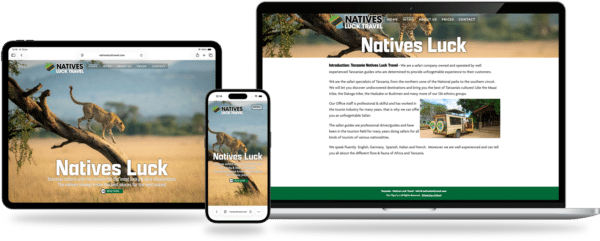 Three devices (laptop, tablet, and smartphone) show the Natives Luck Travel website with a cheetah on a tree in a safari background and bold logo text.